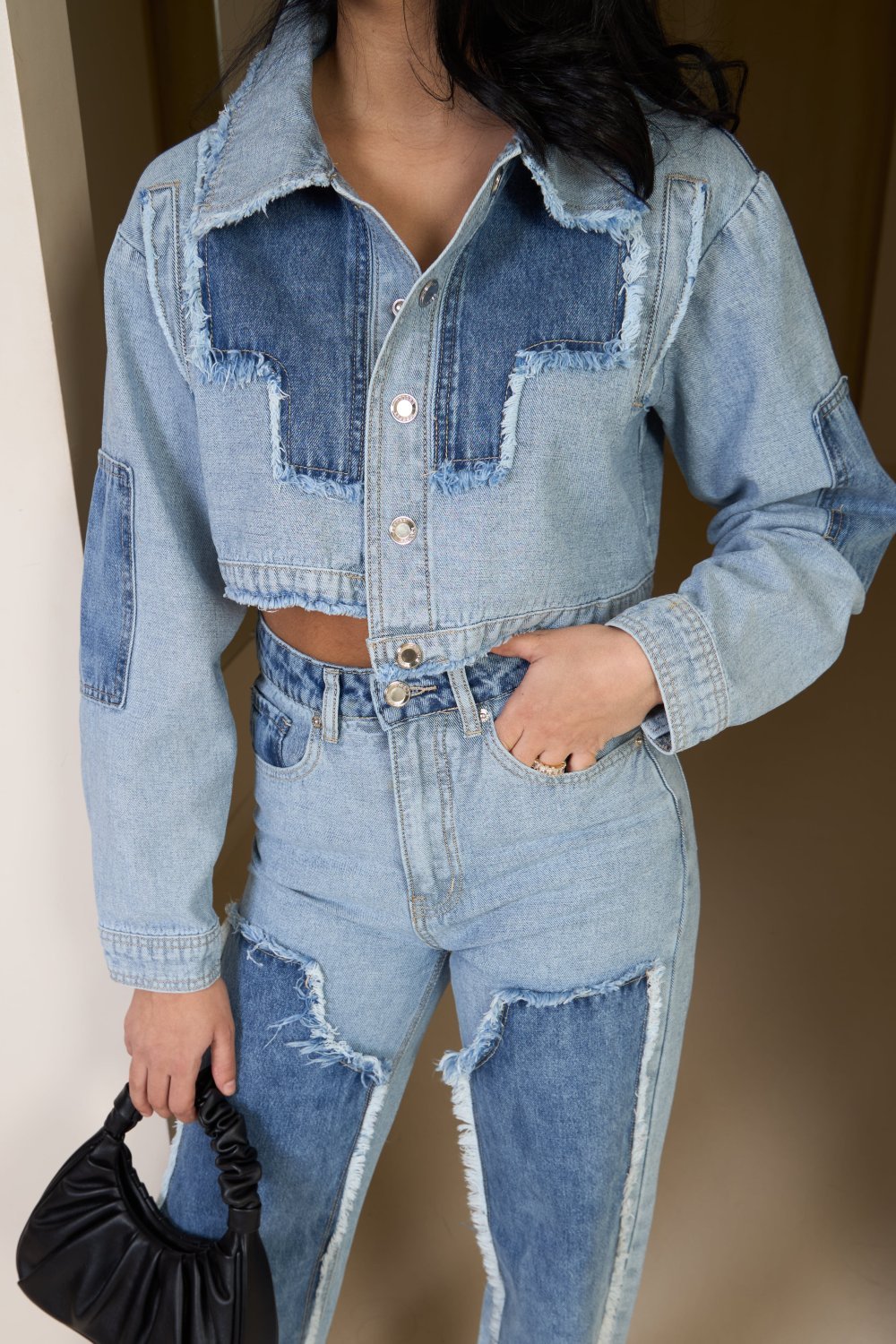 Short blue frayed denim jacket