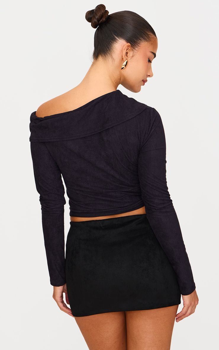 Haut f PU asymétrique b ktef 3eryan
