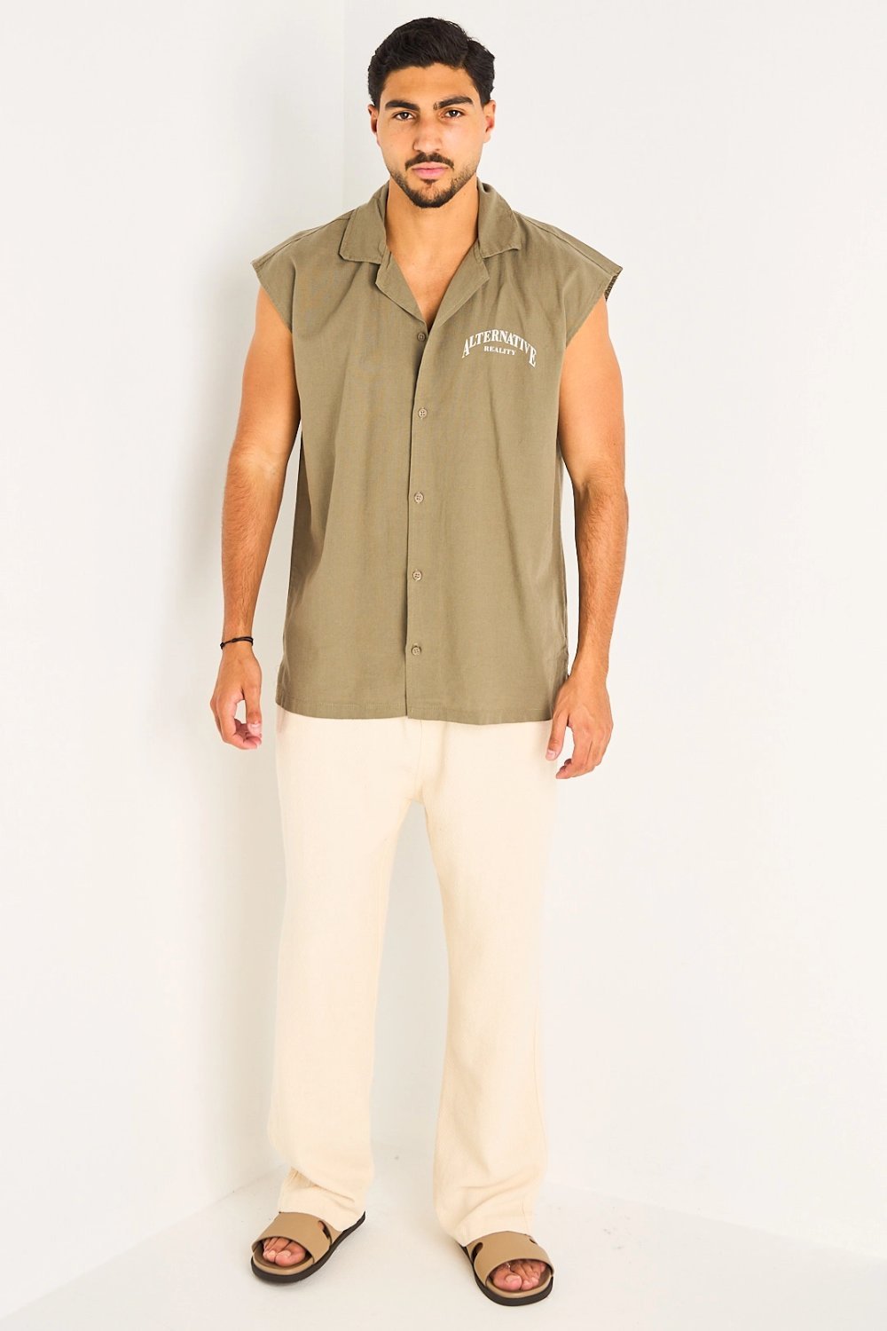 Chemise bla manches b ktaba w njma kaki