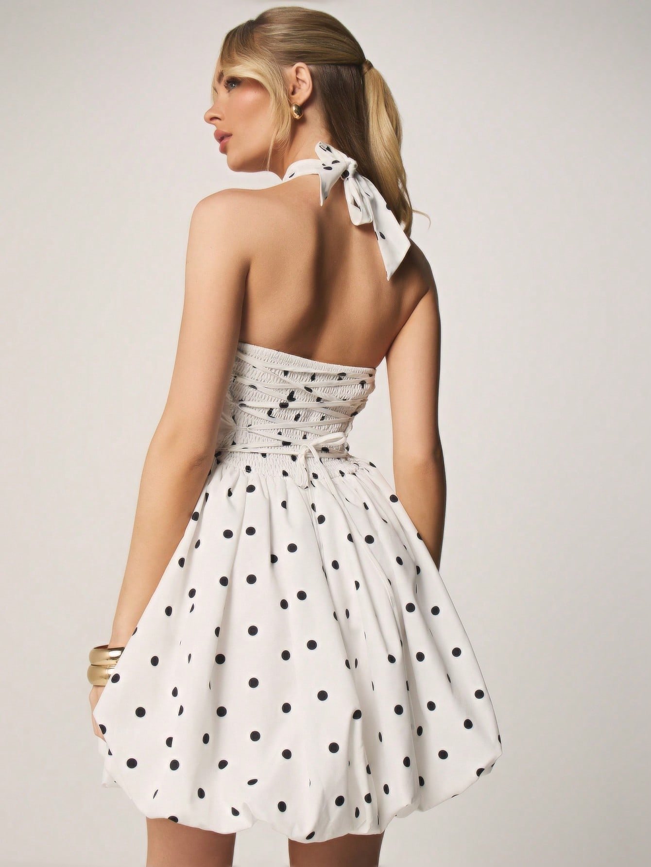 Backless polka dot mini dress