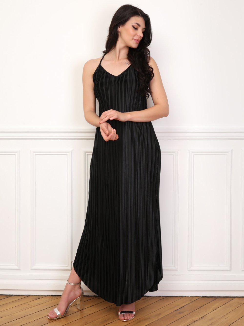 Black satin pleated dress with curved hem