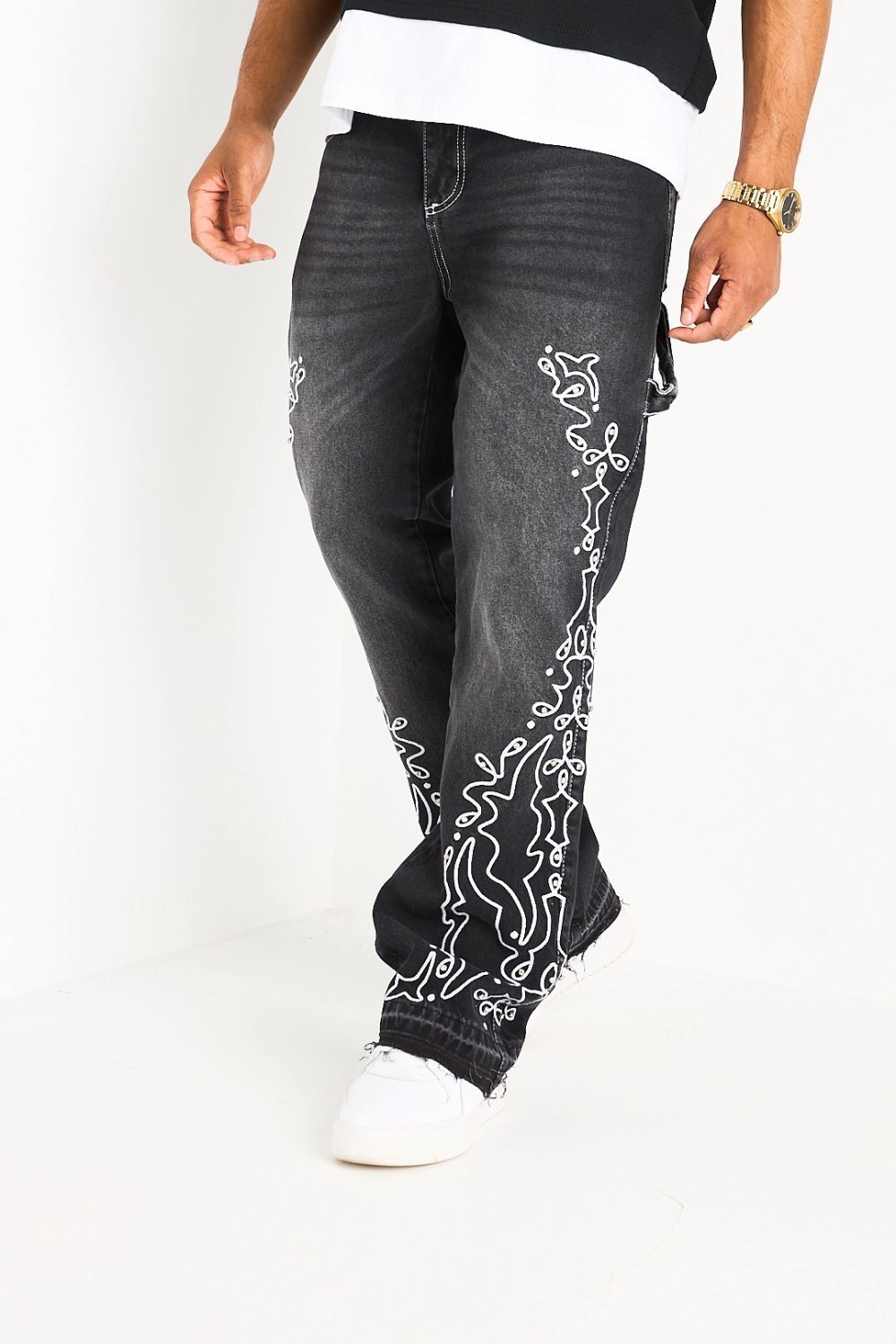 Black straight jeans with arabesque pattern