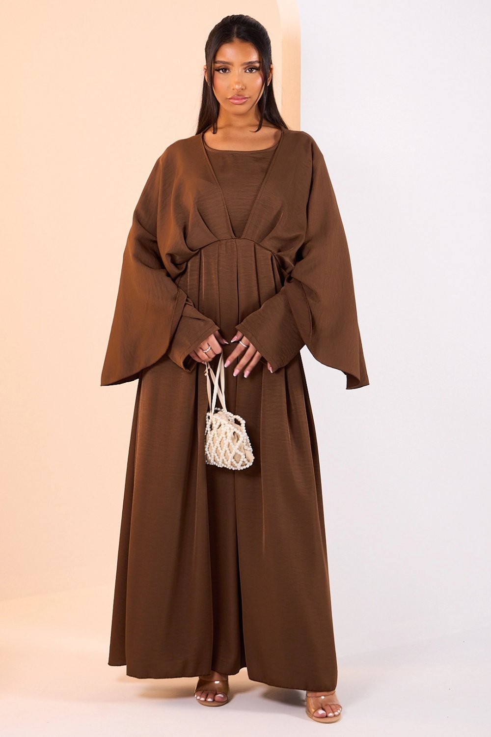 Abaya qehwiya b kmam chauve-souris