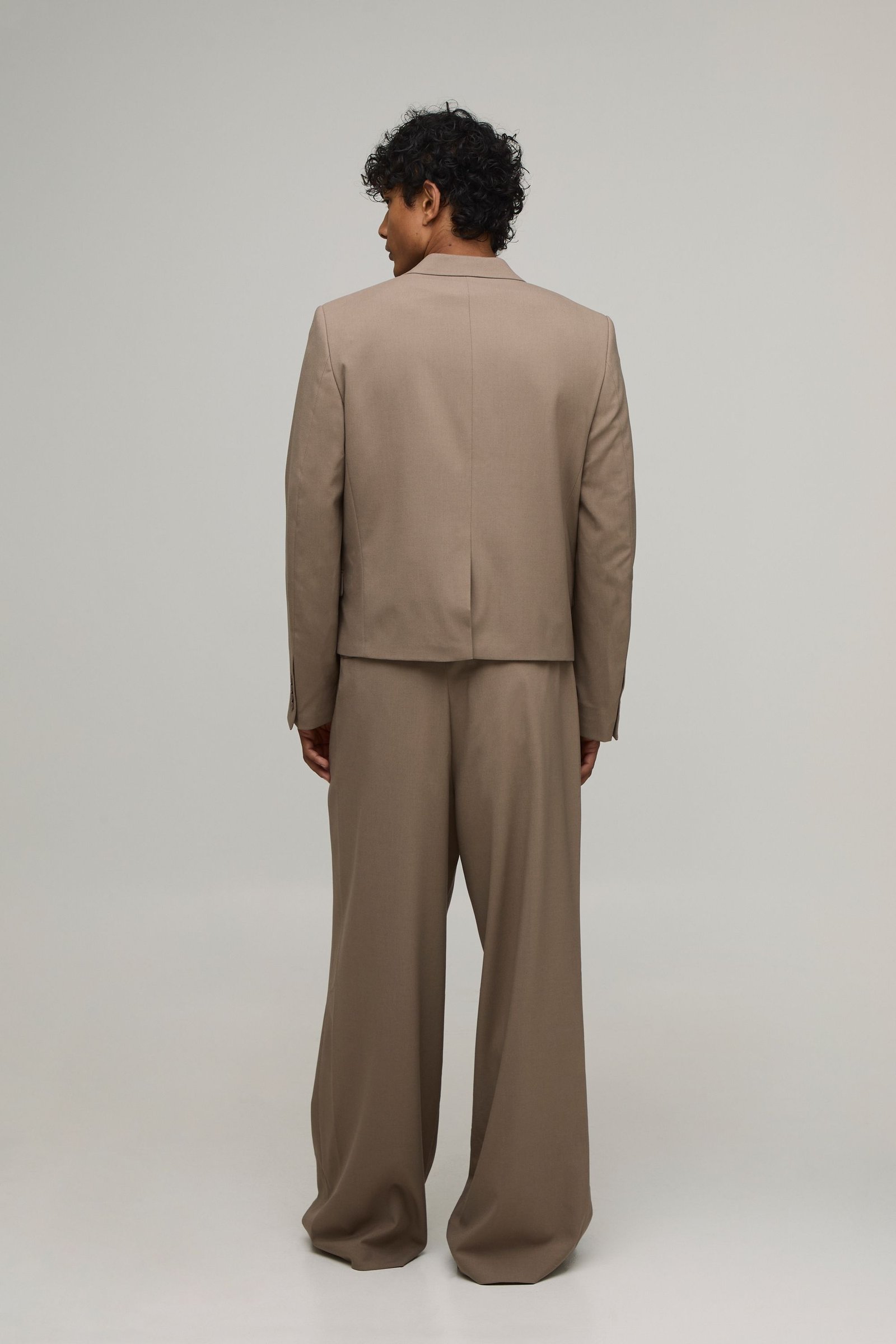 Pantalon De Costume Coupe Large Ajustée Avec Plis Devant