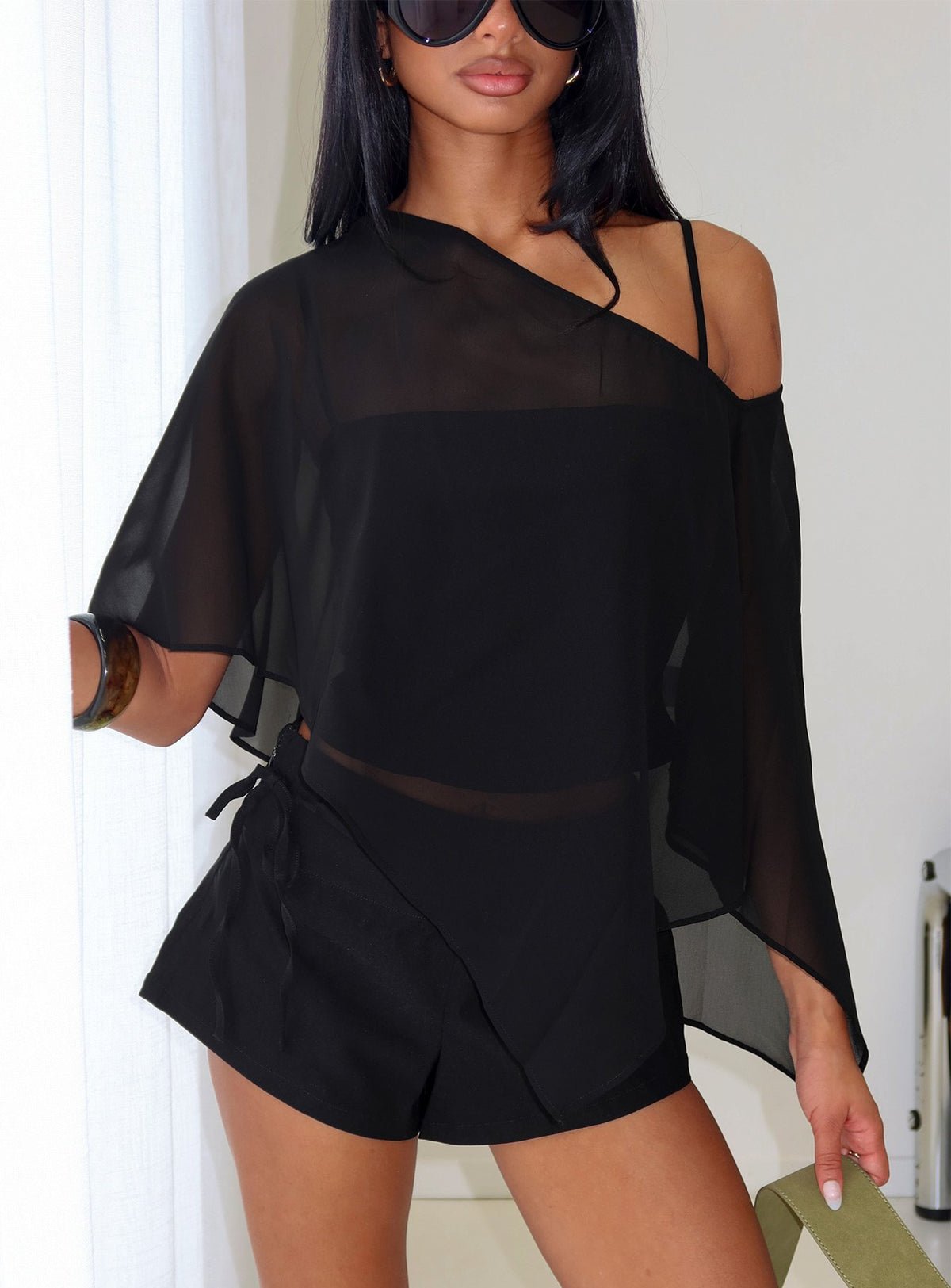 Asymmetric chiffon poncho top