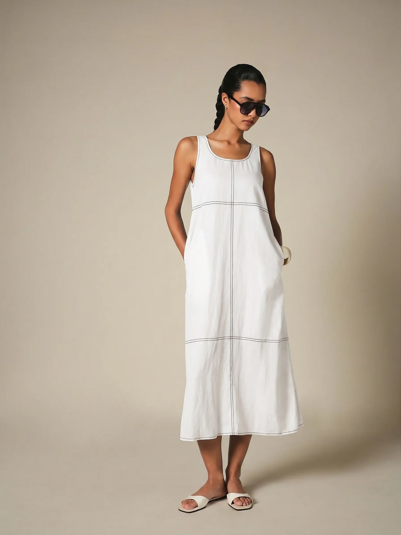 Sleeveless contrast-stitch midi dress with pockets