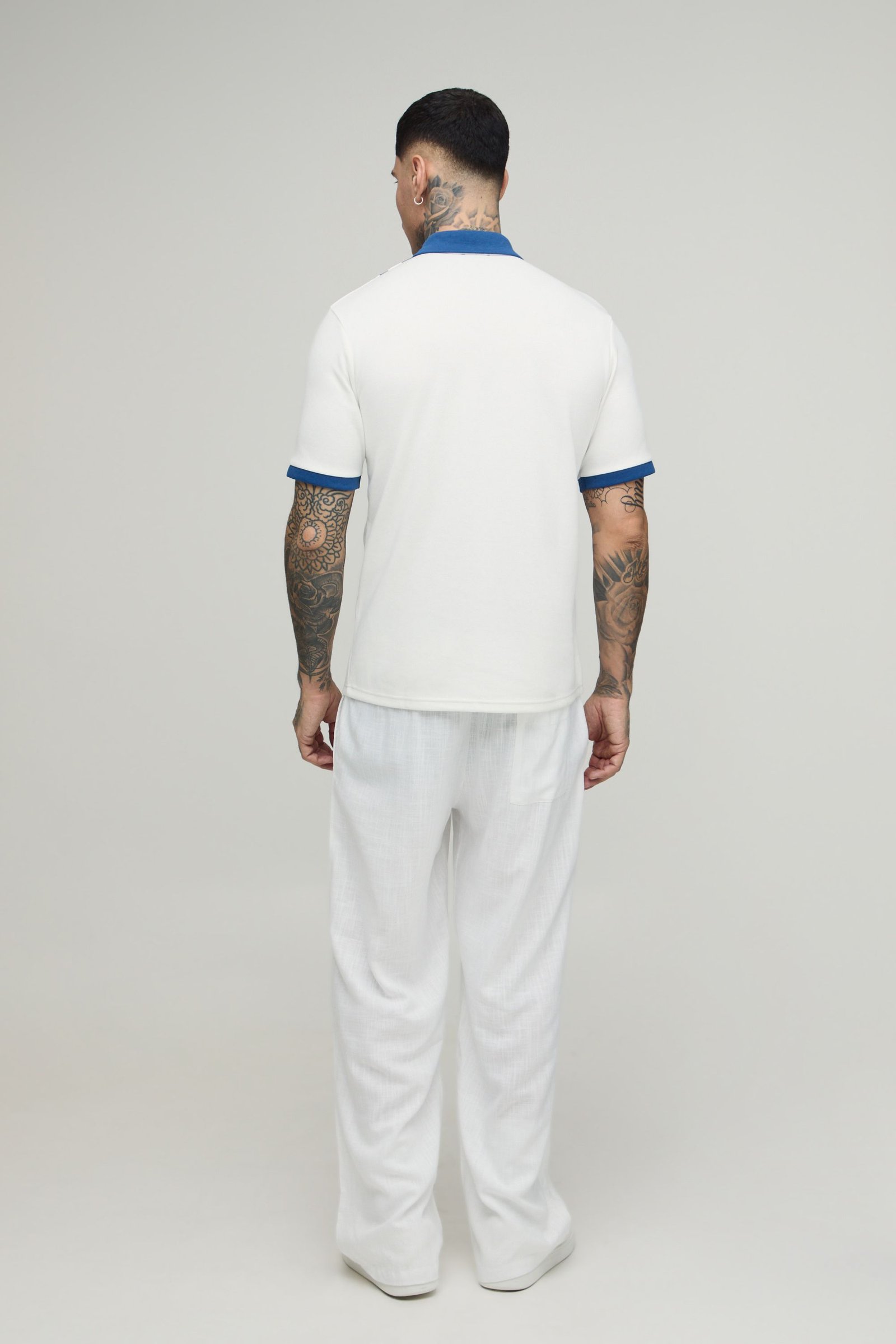 Polo interlock col zippé à empiècements - Tall