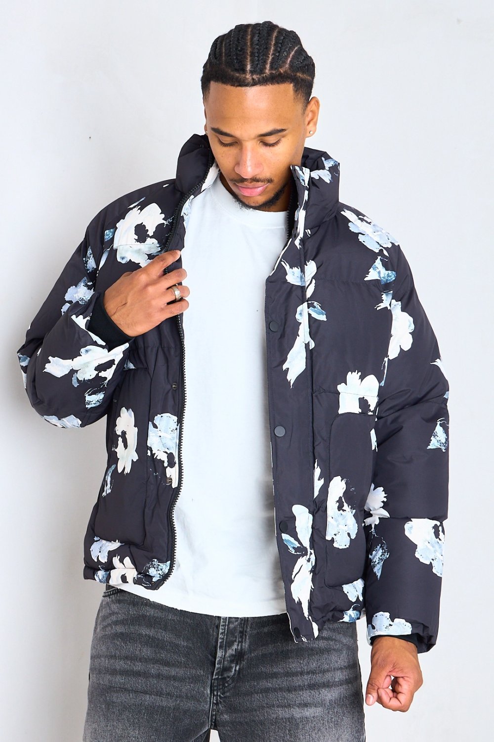 Black high-neck puffer jacket with white print