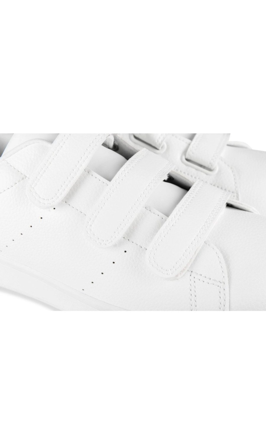 White trainers with three touch straps