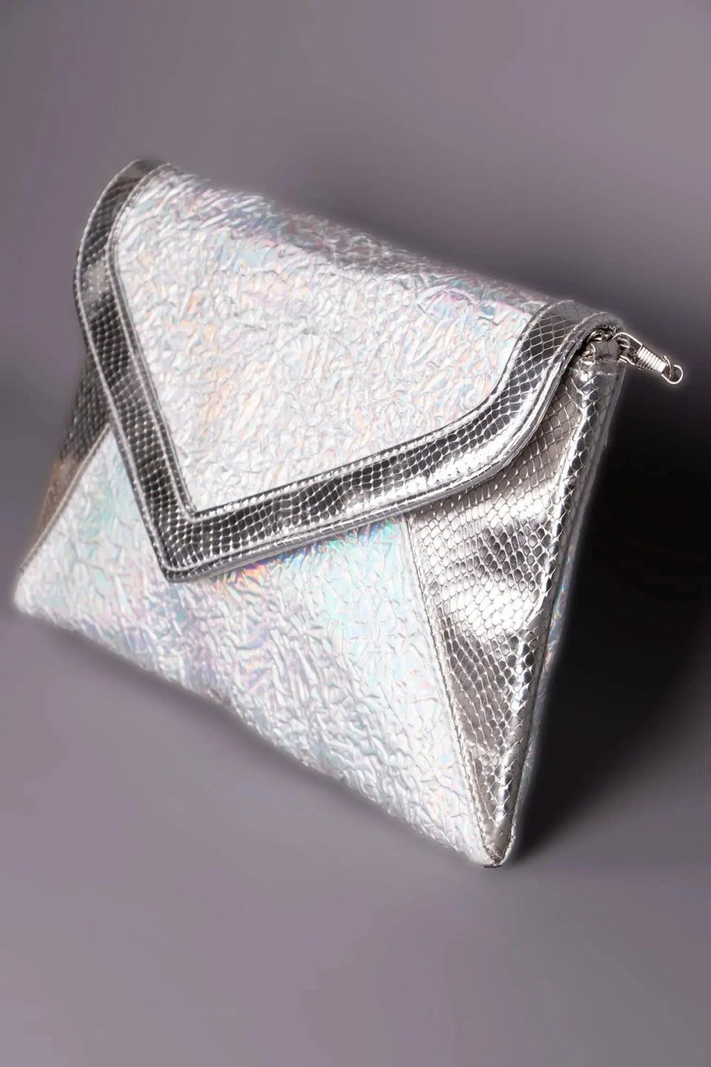Holographic silver envelope clutch