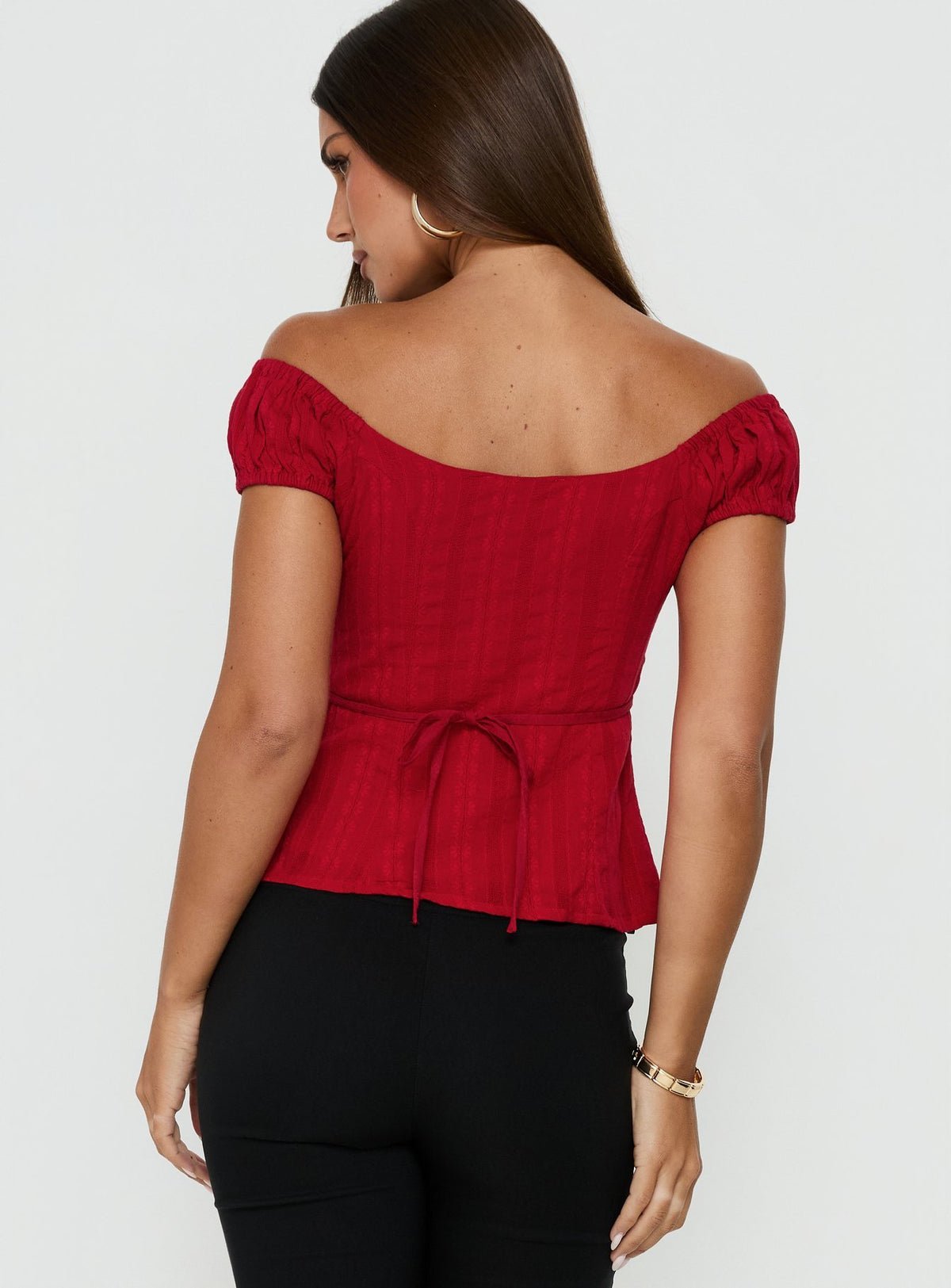 Off-shoulder button-up frill top