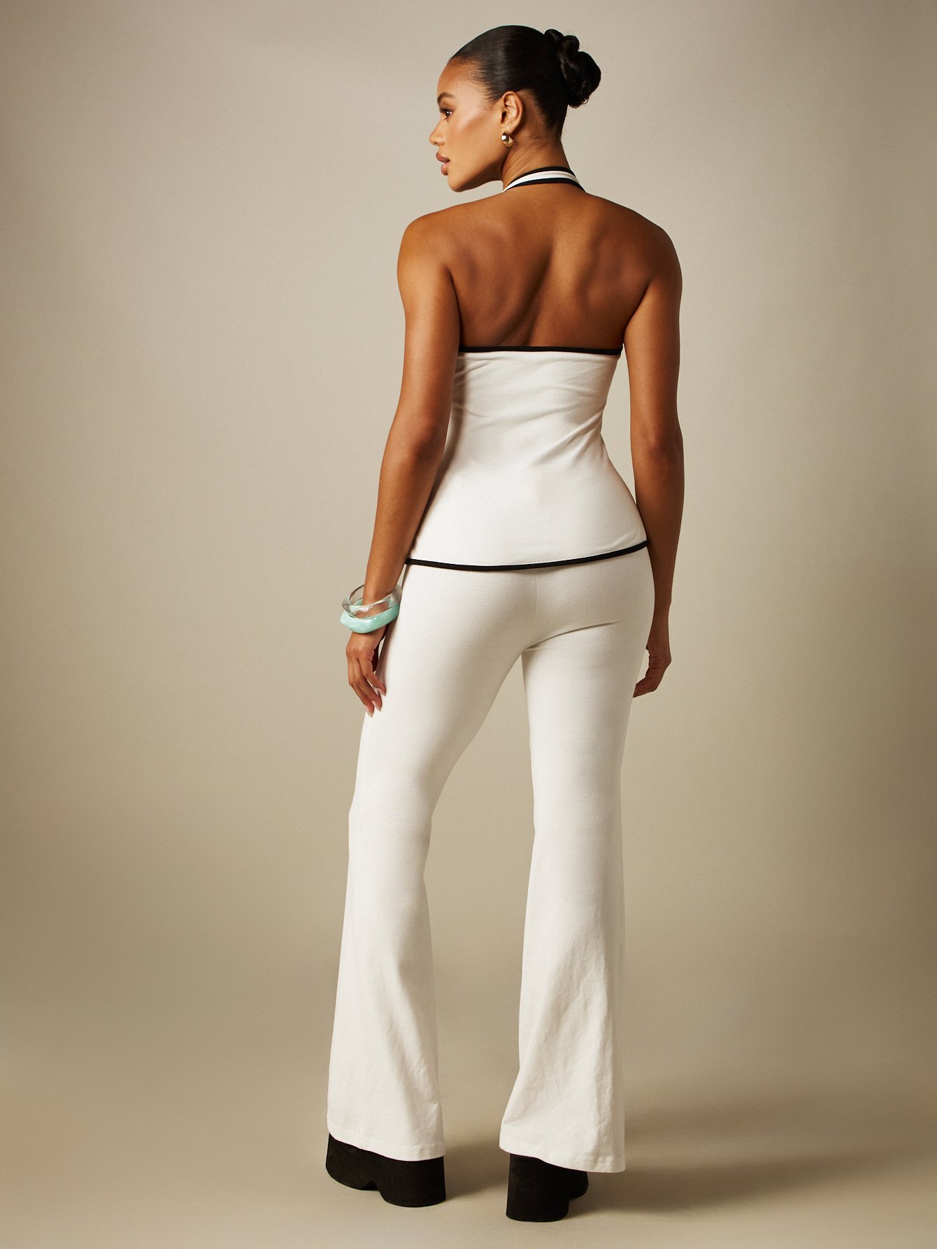 Backless tank top and flared trousers set