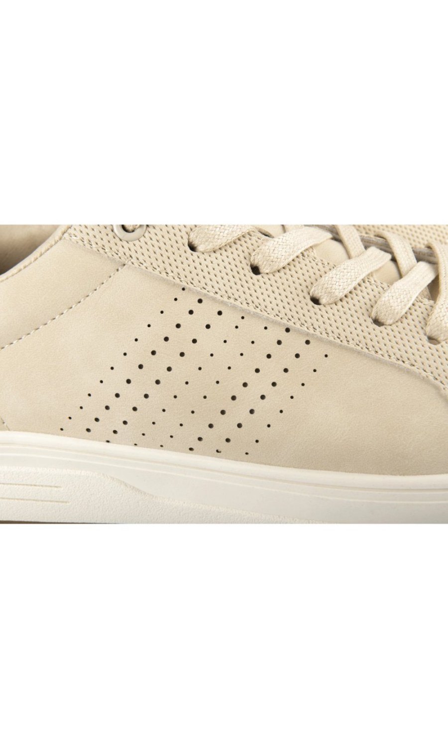 Beige perforated sneakers with tan heel tab