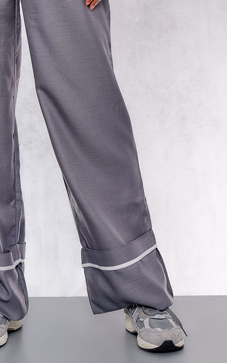 Pleat front wide leg trousers with turn-ups