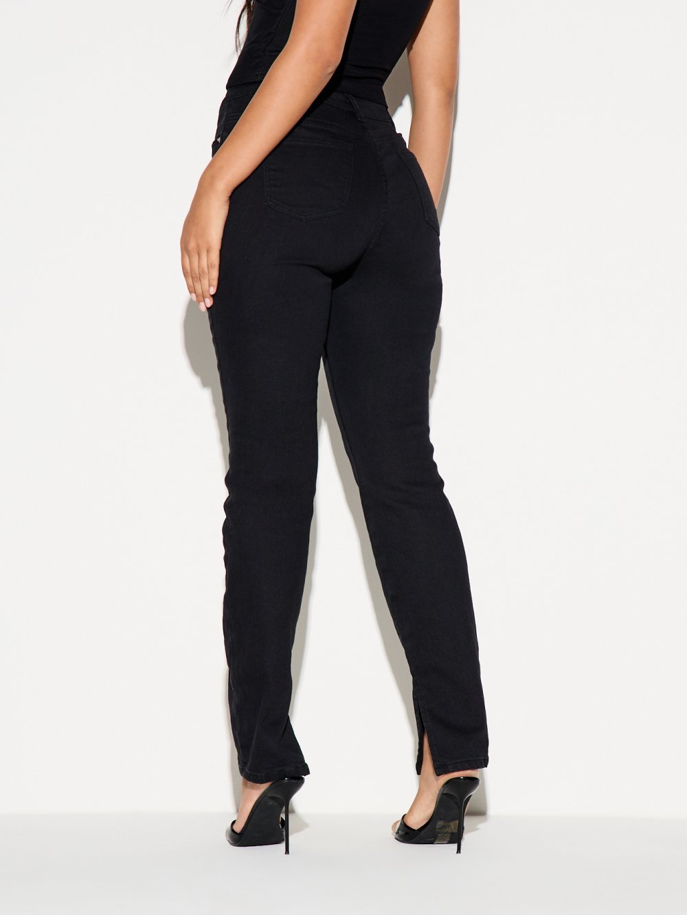 Jean skinny taille haute à ourlet fendu noir