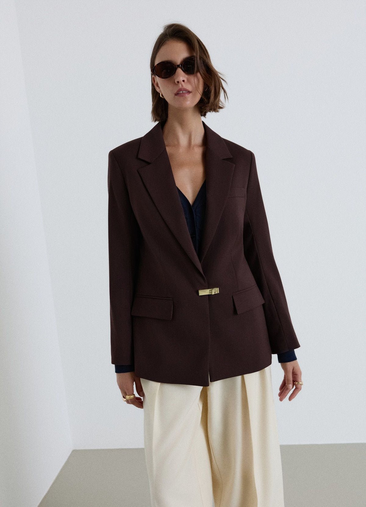 Wrap blazer with buckle fastening