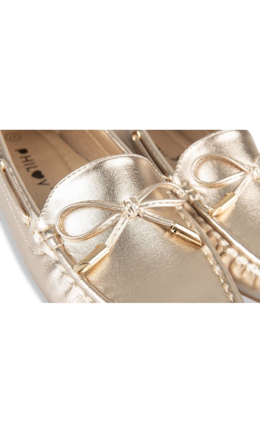 Gold metallic loafers with bow