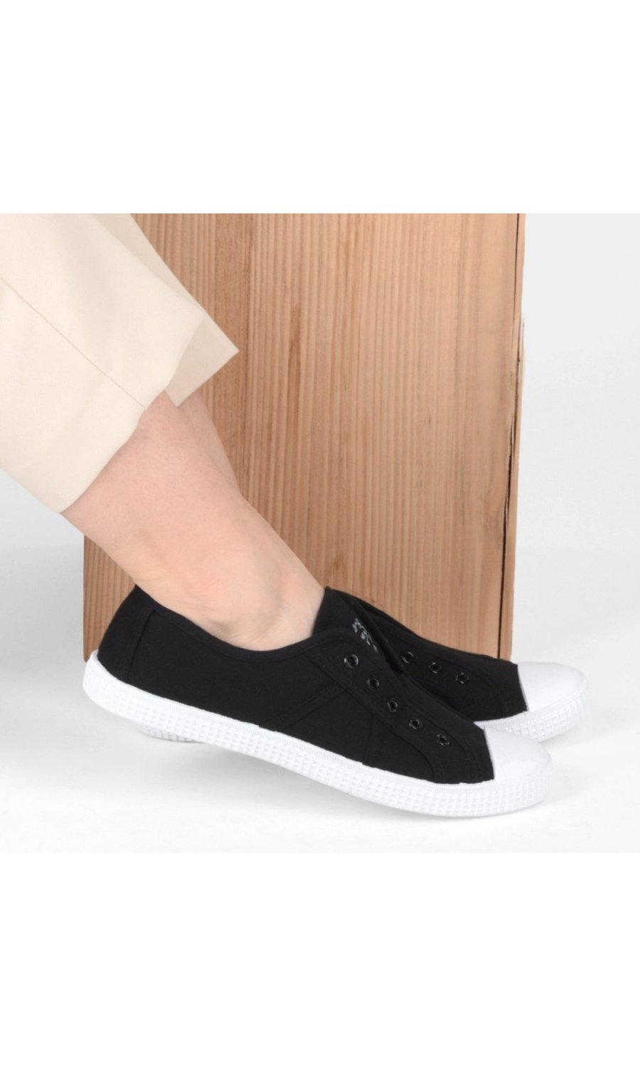 Black elasticated canvas sneakers