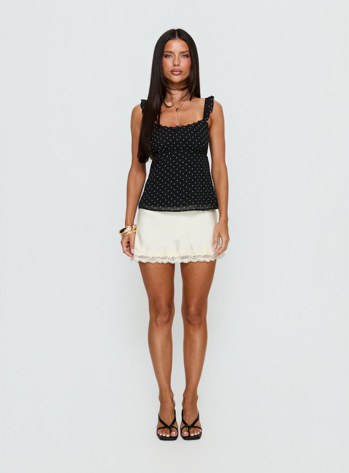 Polka-dot bow top with lace trim