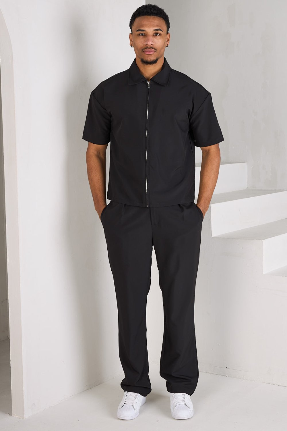 Black zip jacket and belted trousers set