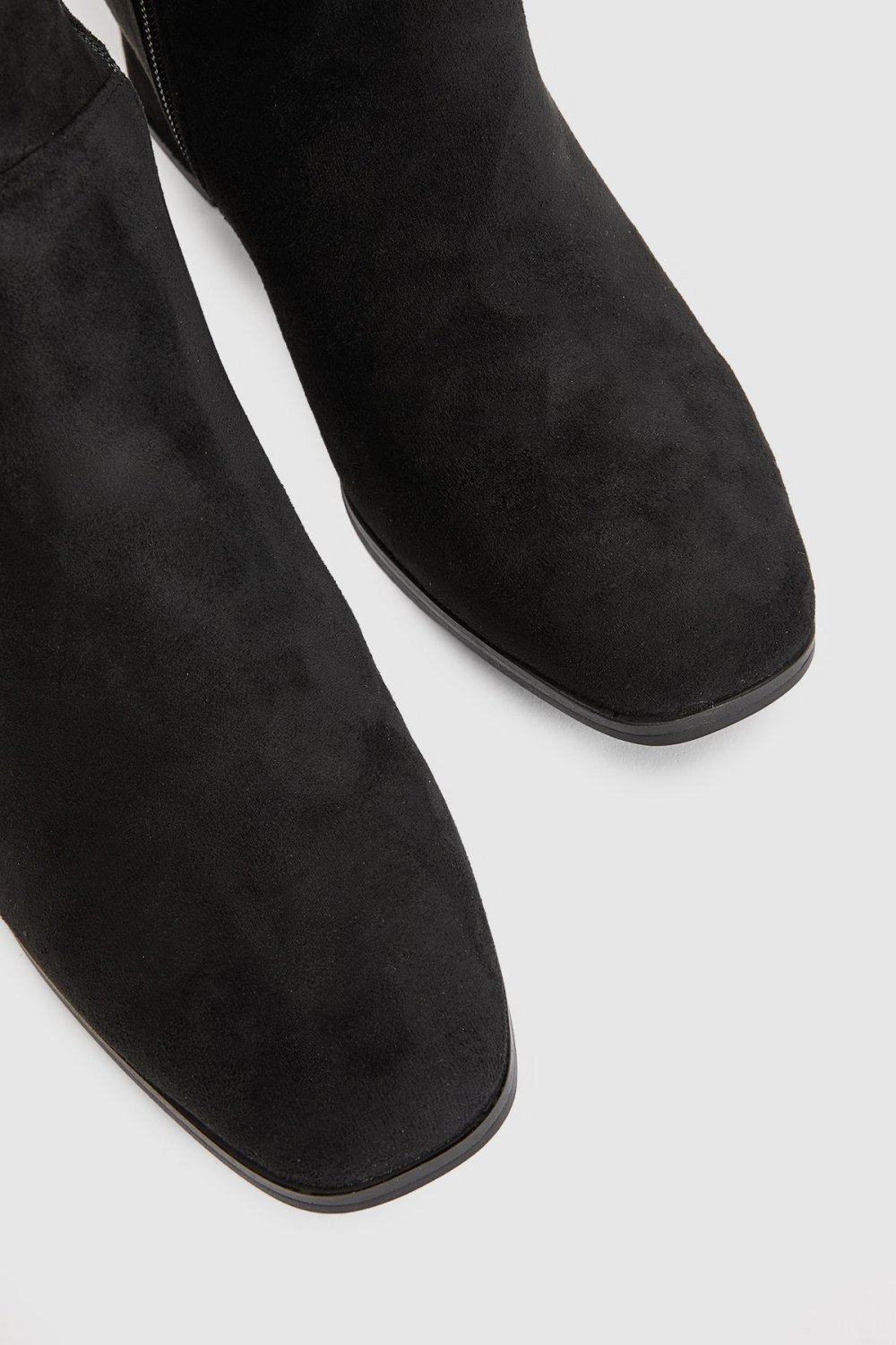 Slouchy faux suede knee-high boots