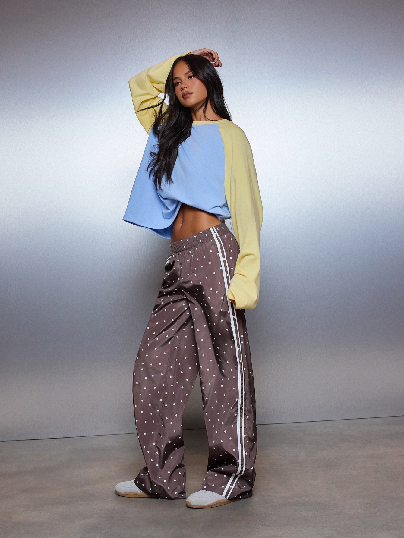 Polka dot wide leg trousers with side stripe