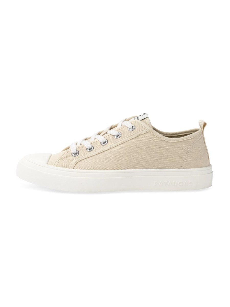 Beige canvas sneakers with rubber toe