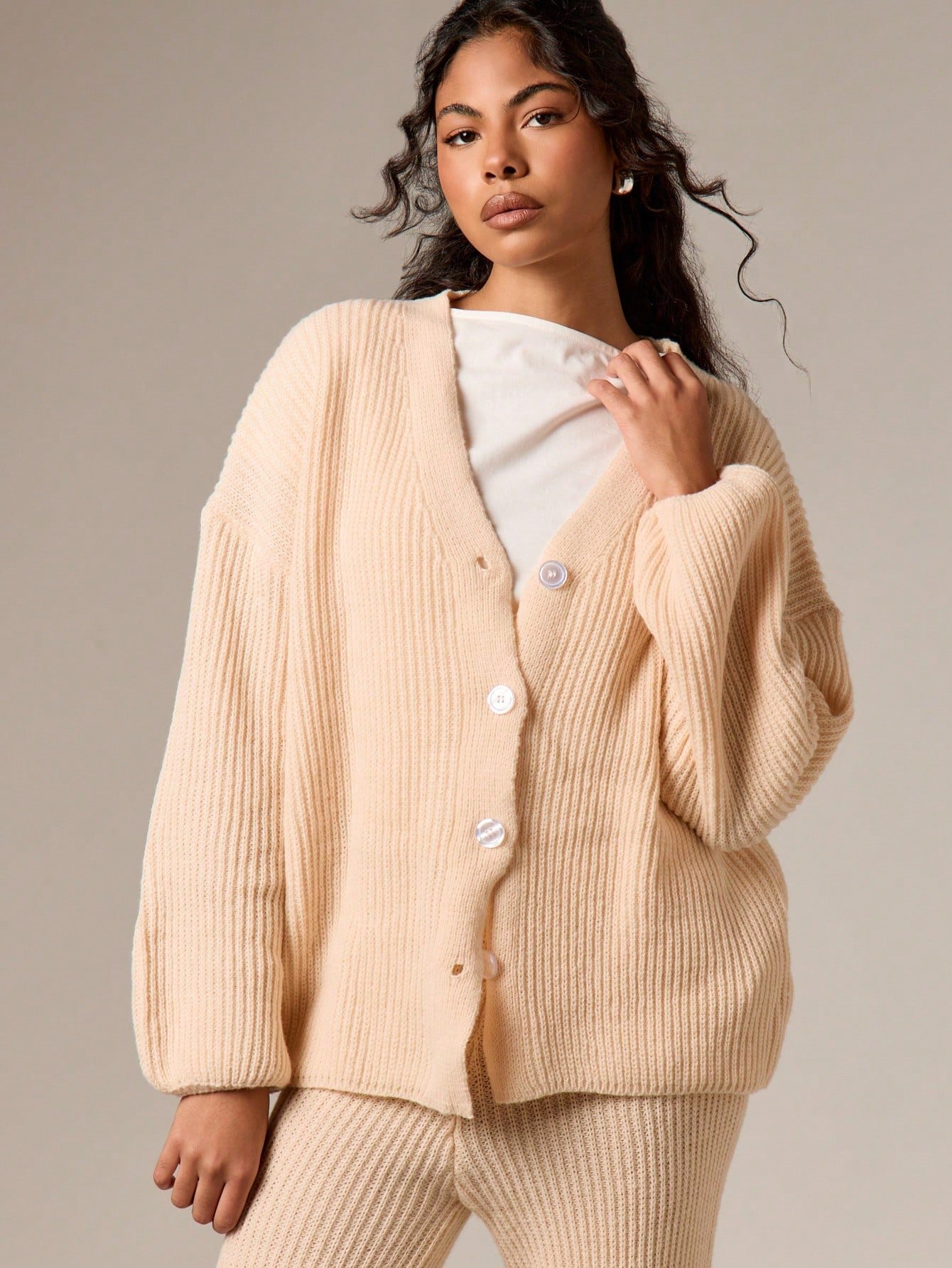 Ribbed cardigan and flared trousers set