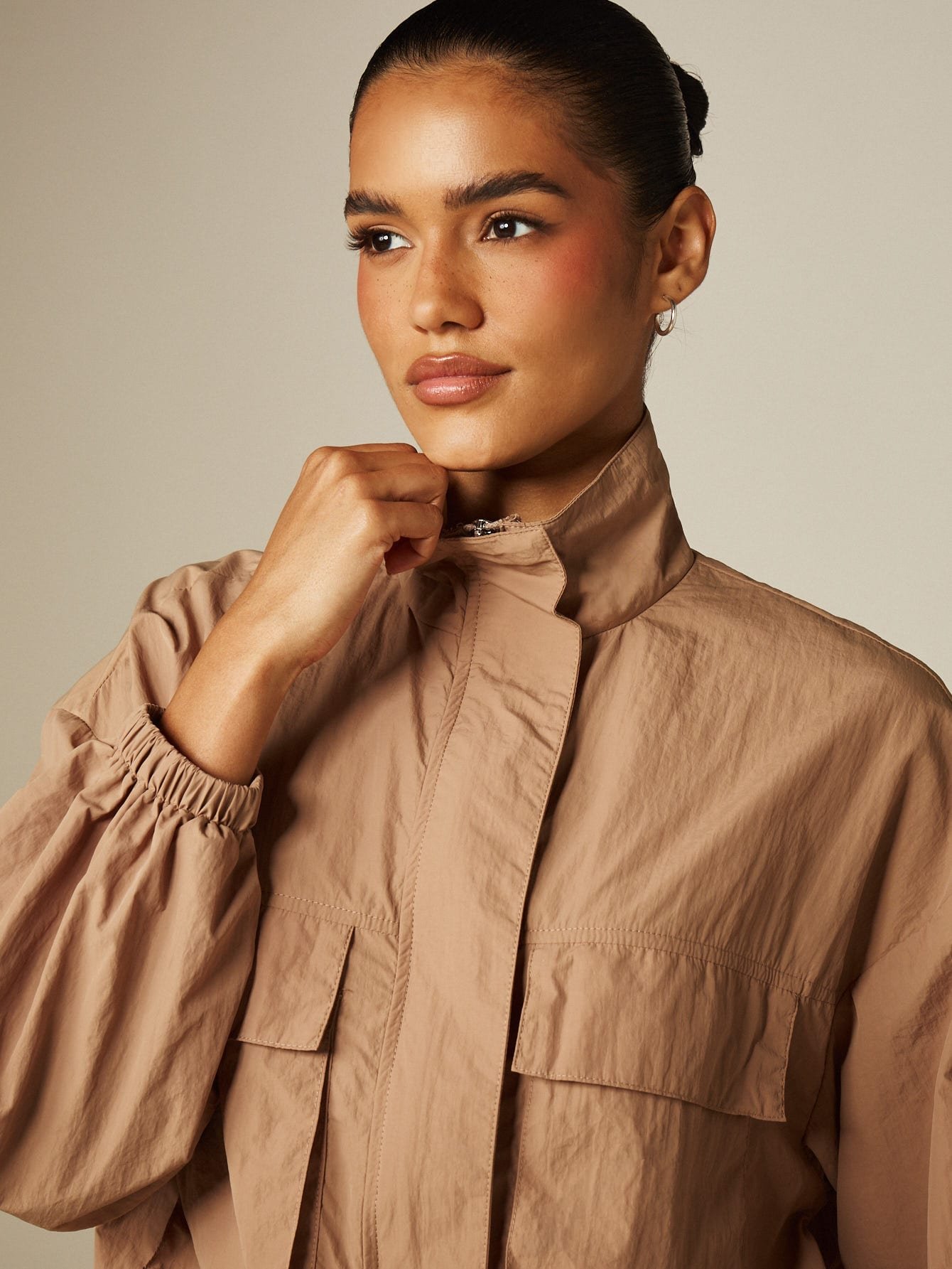 Utility windbreaker jacket with cargo pockets