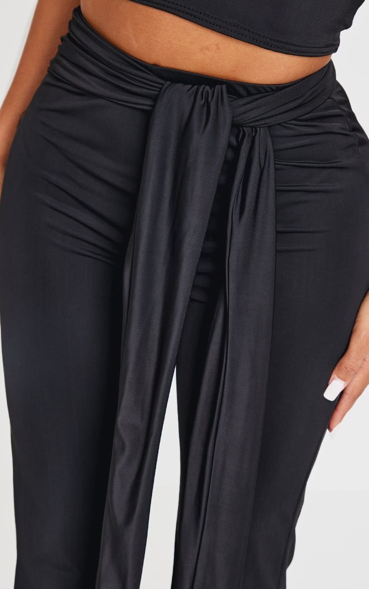 Sculpt wrap waist flared trousers