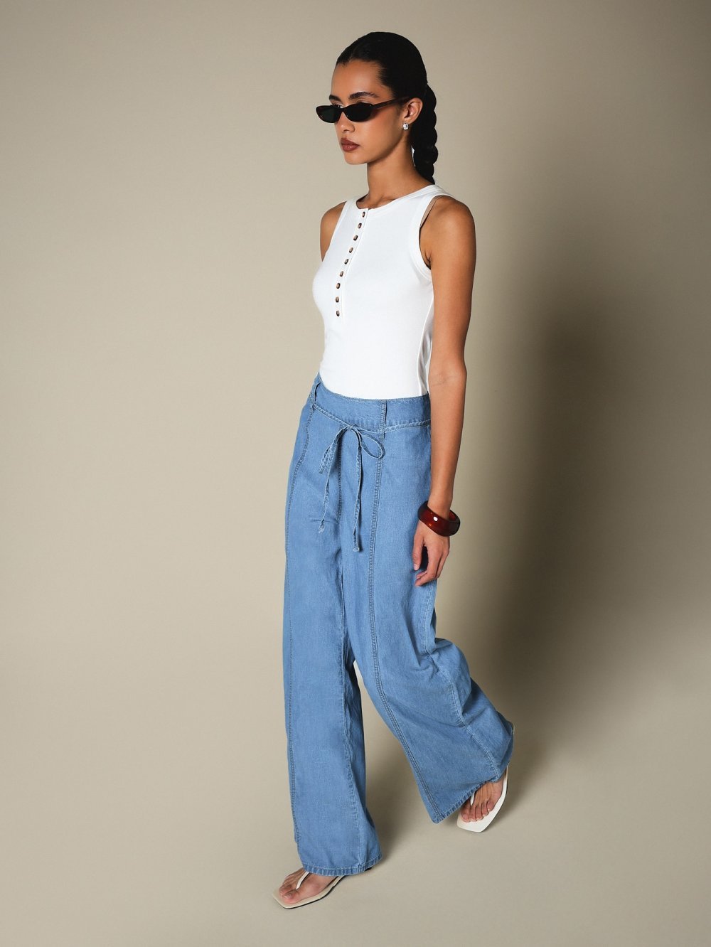 Mid blue high-waisted palazzo jeans with drawstring