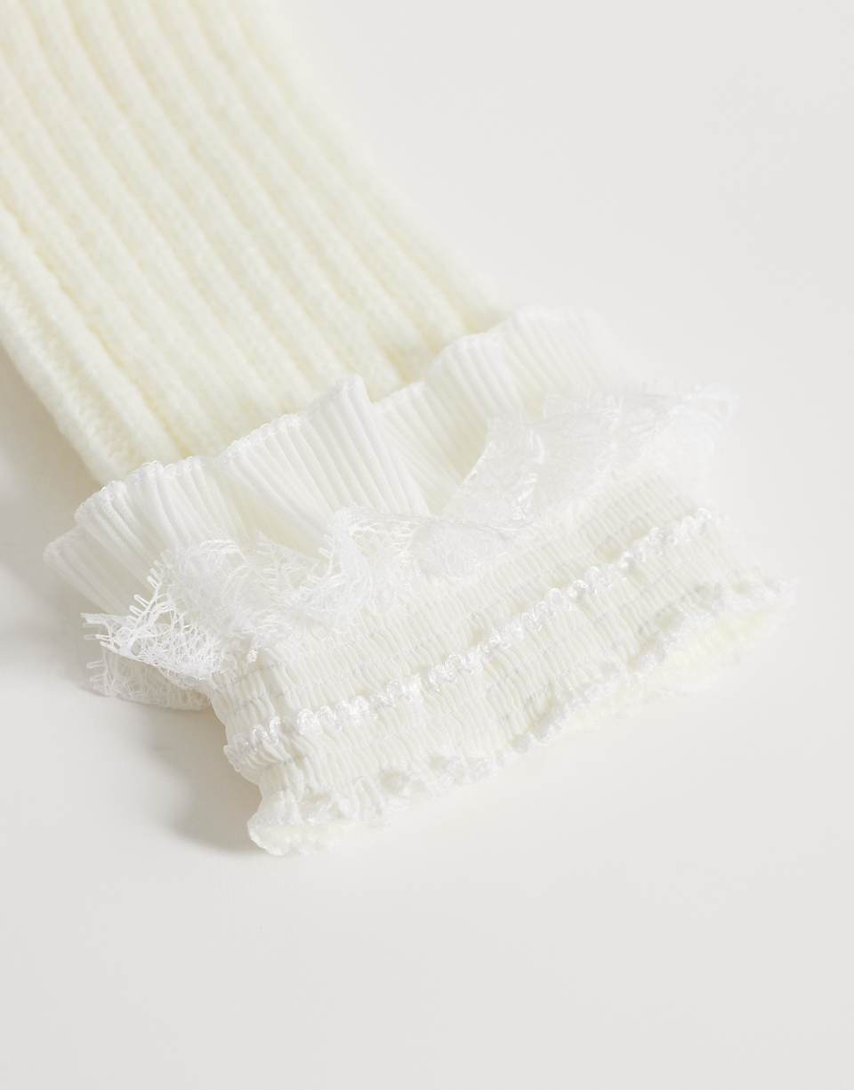 Jambières en dentelle crème