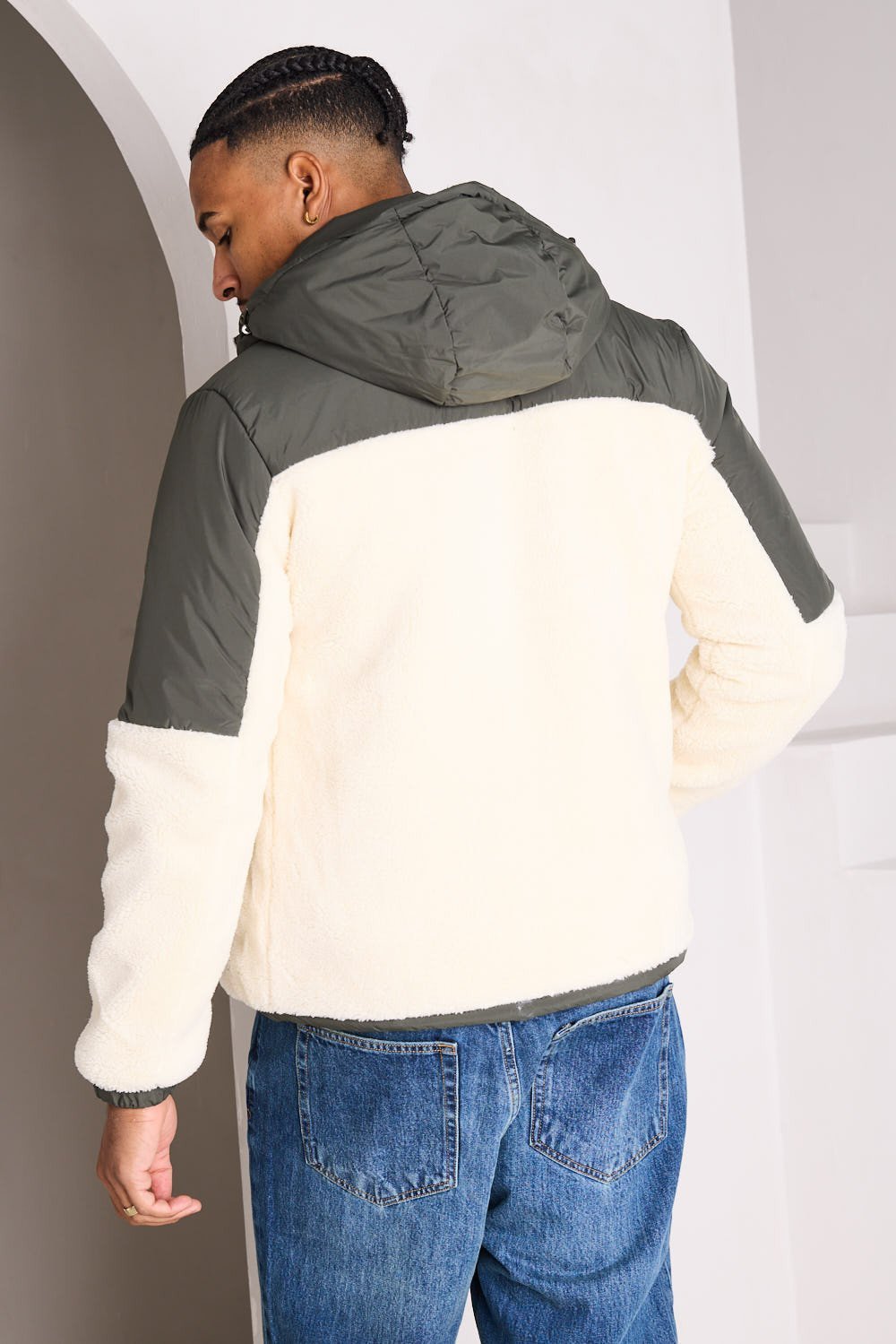 Khaki puffer jacket with shearling-look panel