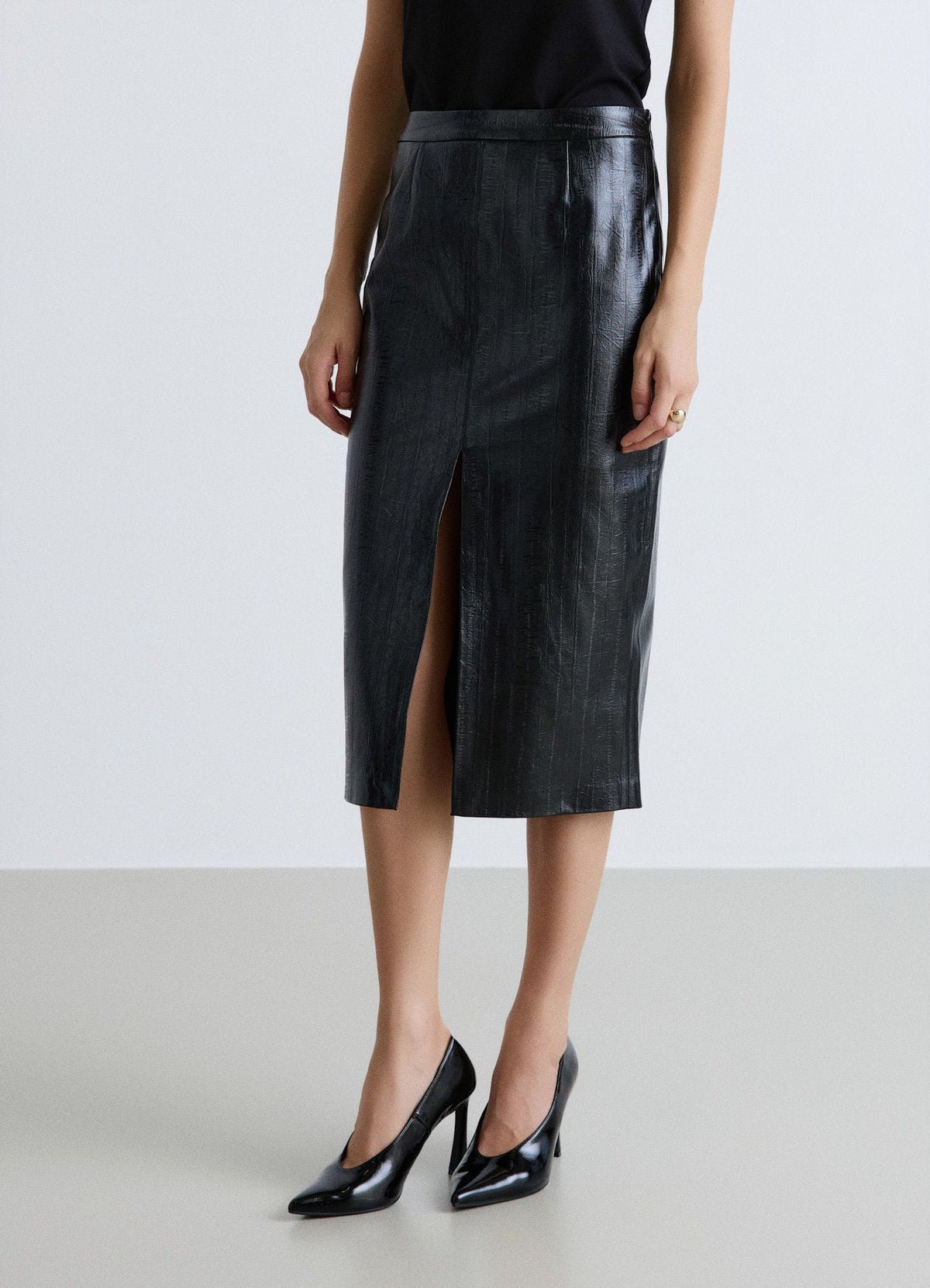 Jupe crayon midi effet cuir fendue