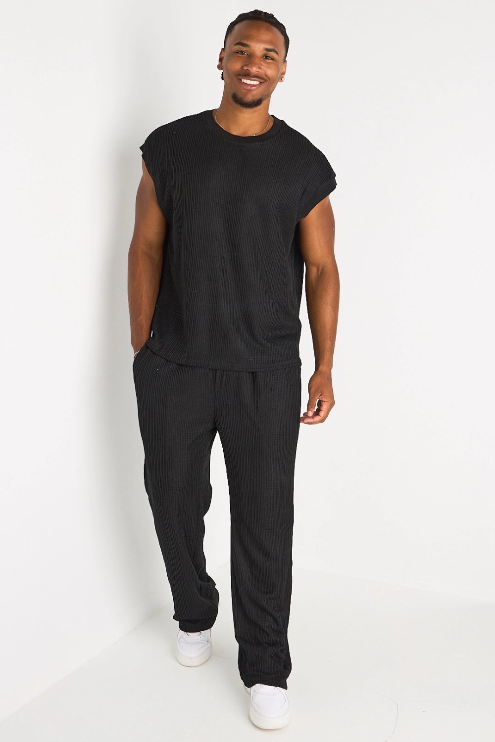 Black knit tank top and trousers set