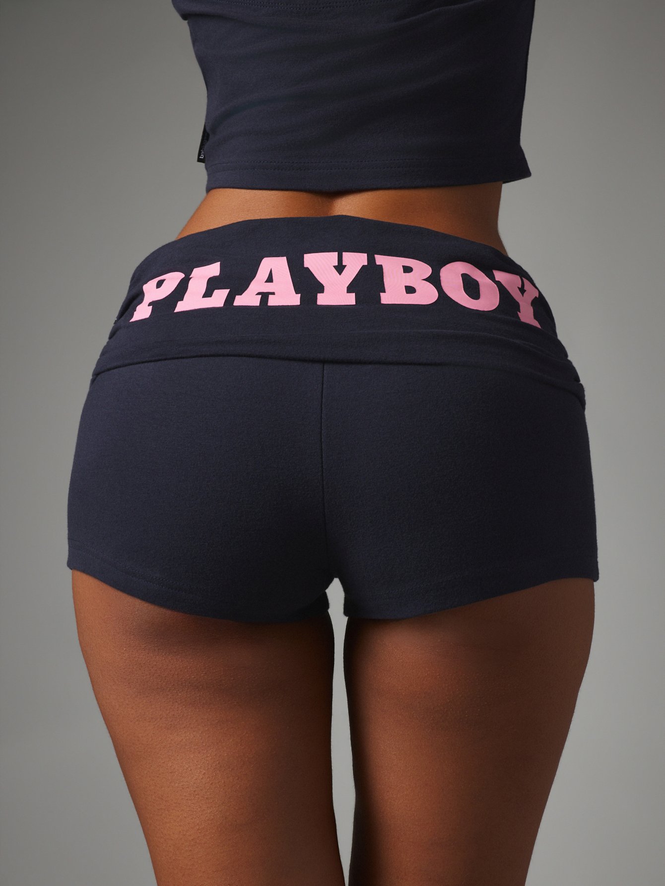 Logo cropped tank top and fold-over hot pants set