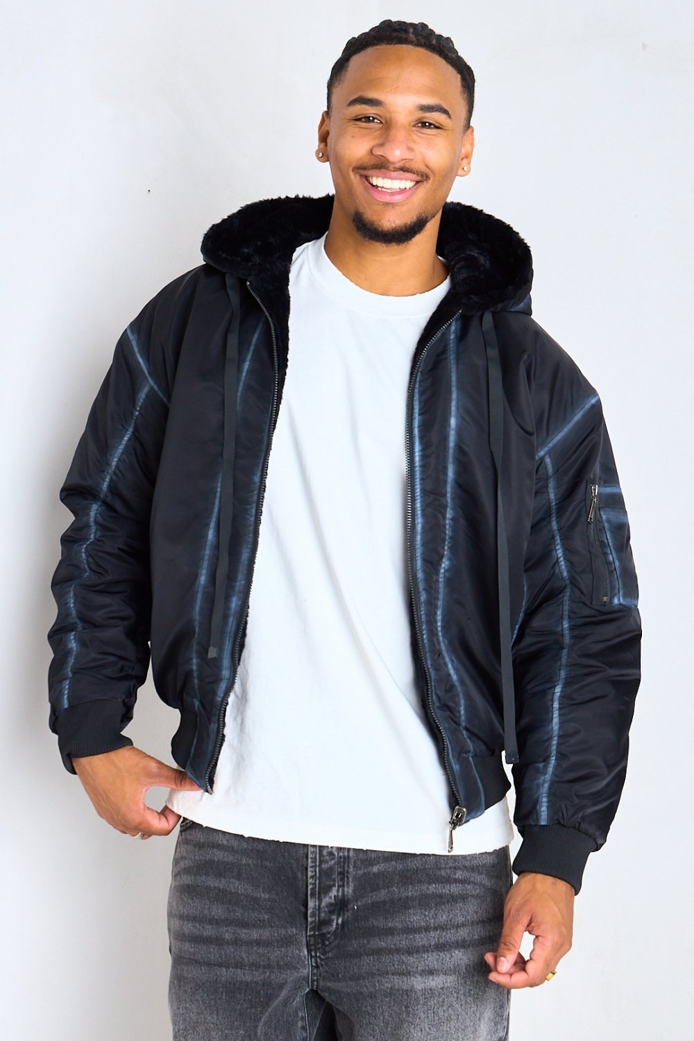 Black reversible hooded bomber with faux fur lining