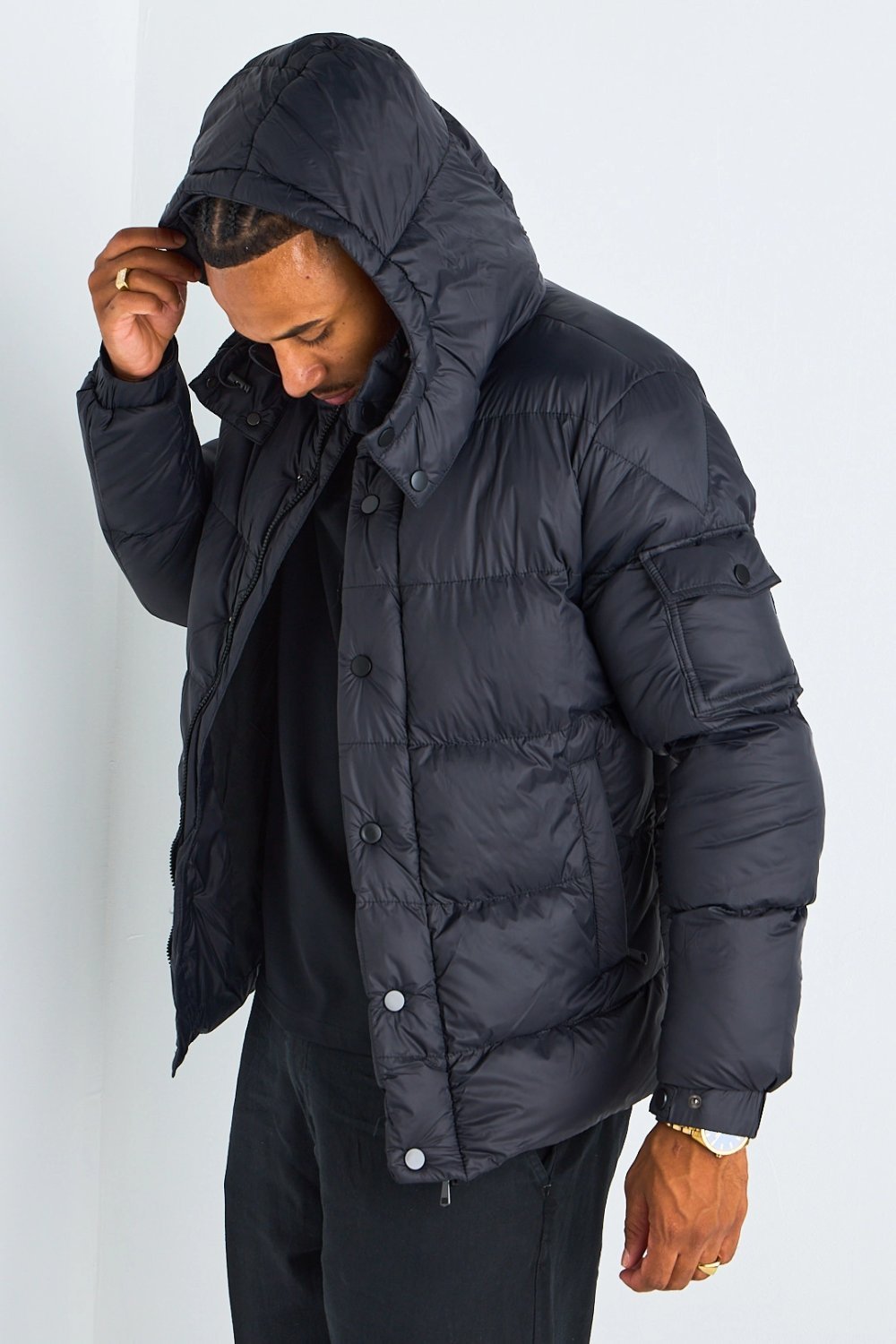 Black hooded vinyl puffer jacket