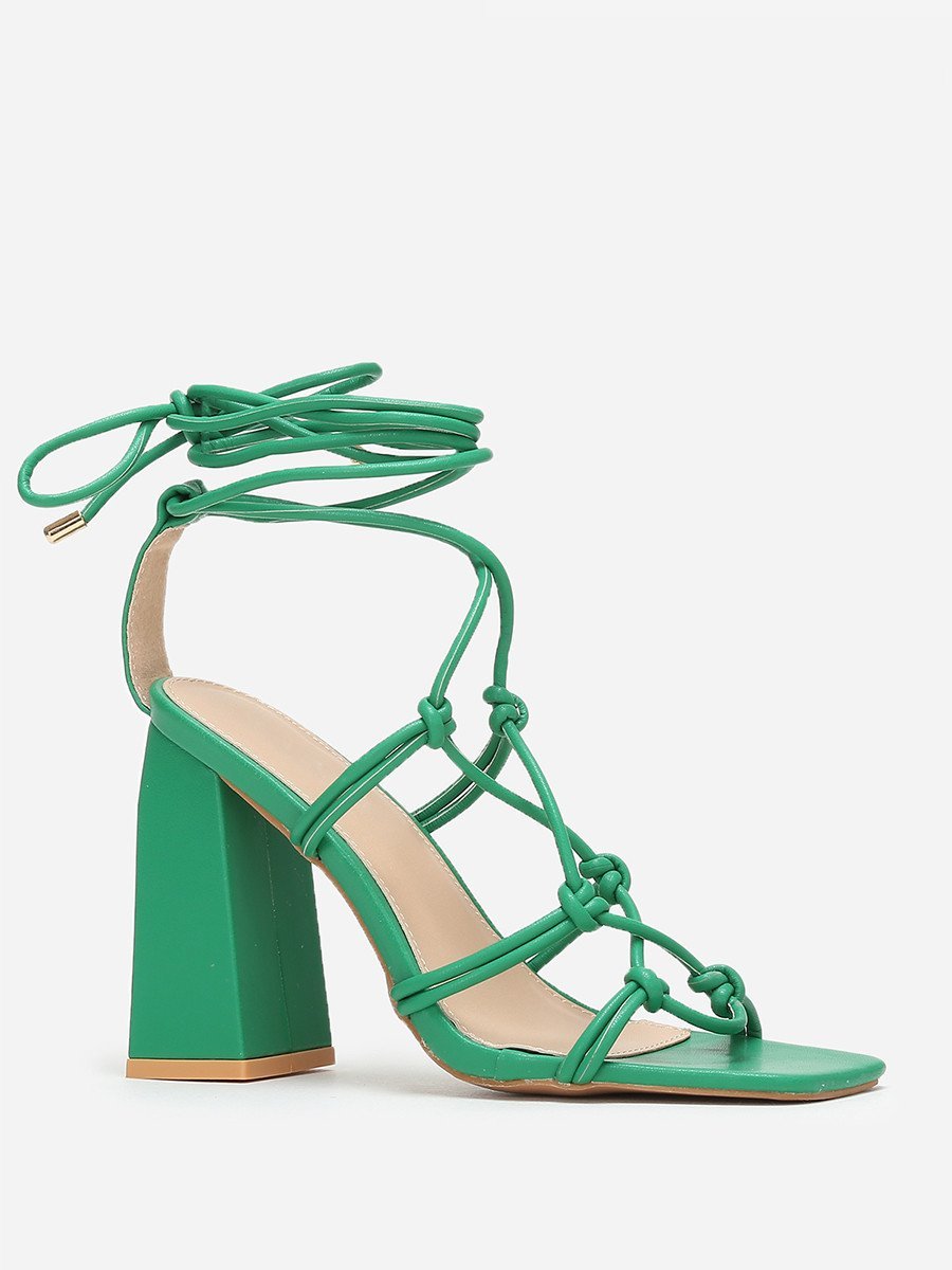 Green block heel sandals with lace-up calf straps