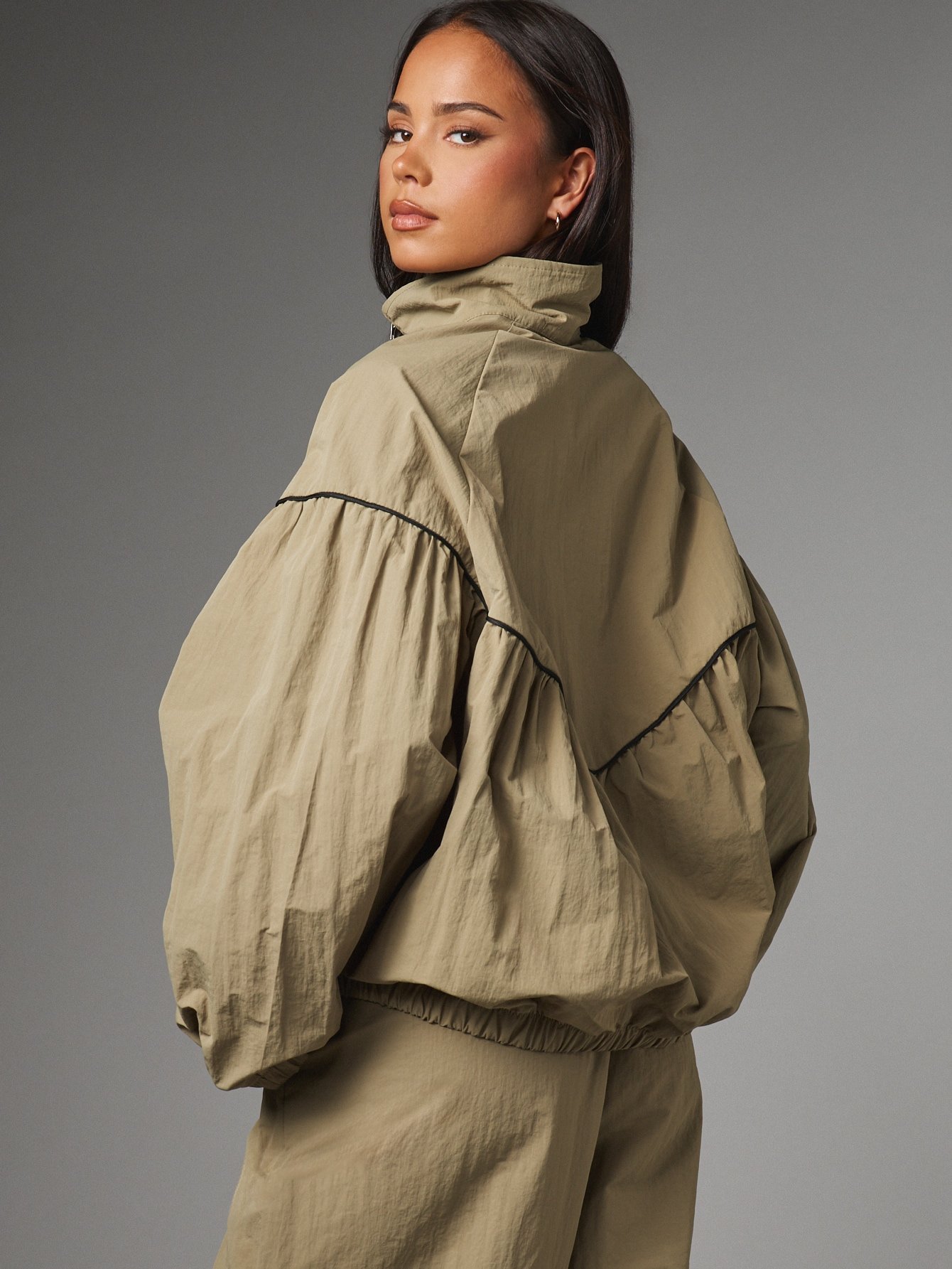 Oversized windbreaker with ruffle hem