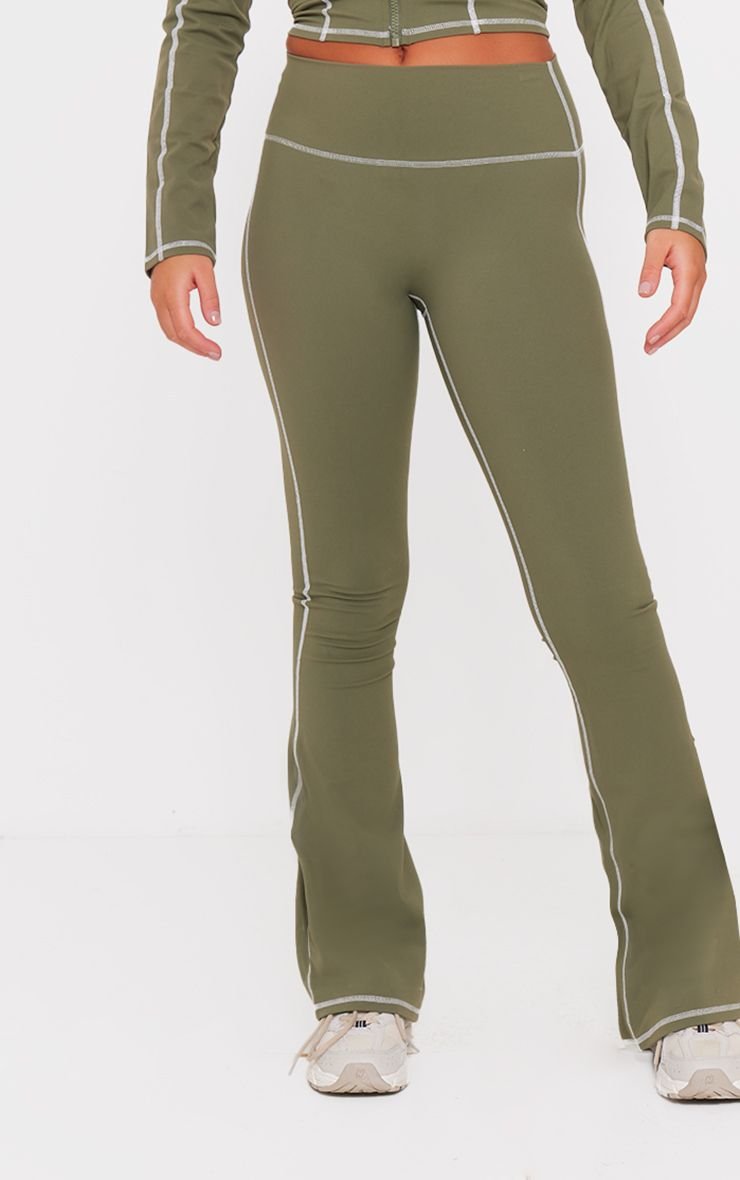 Shaping flared trousers with contrast trim