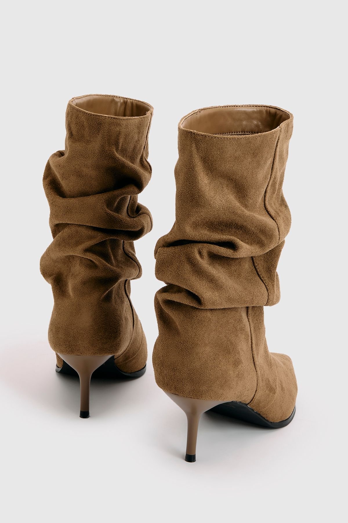 Pointed toe spool heel ankle boots