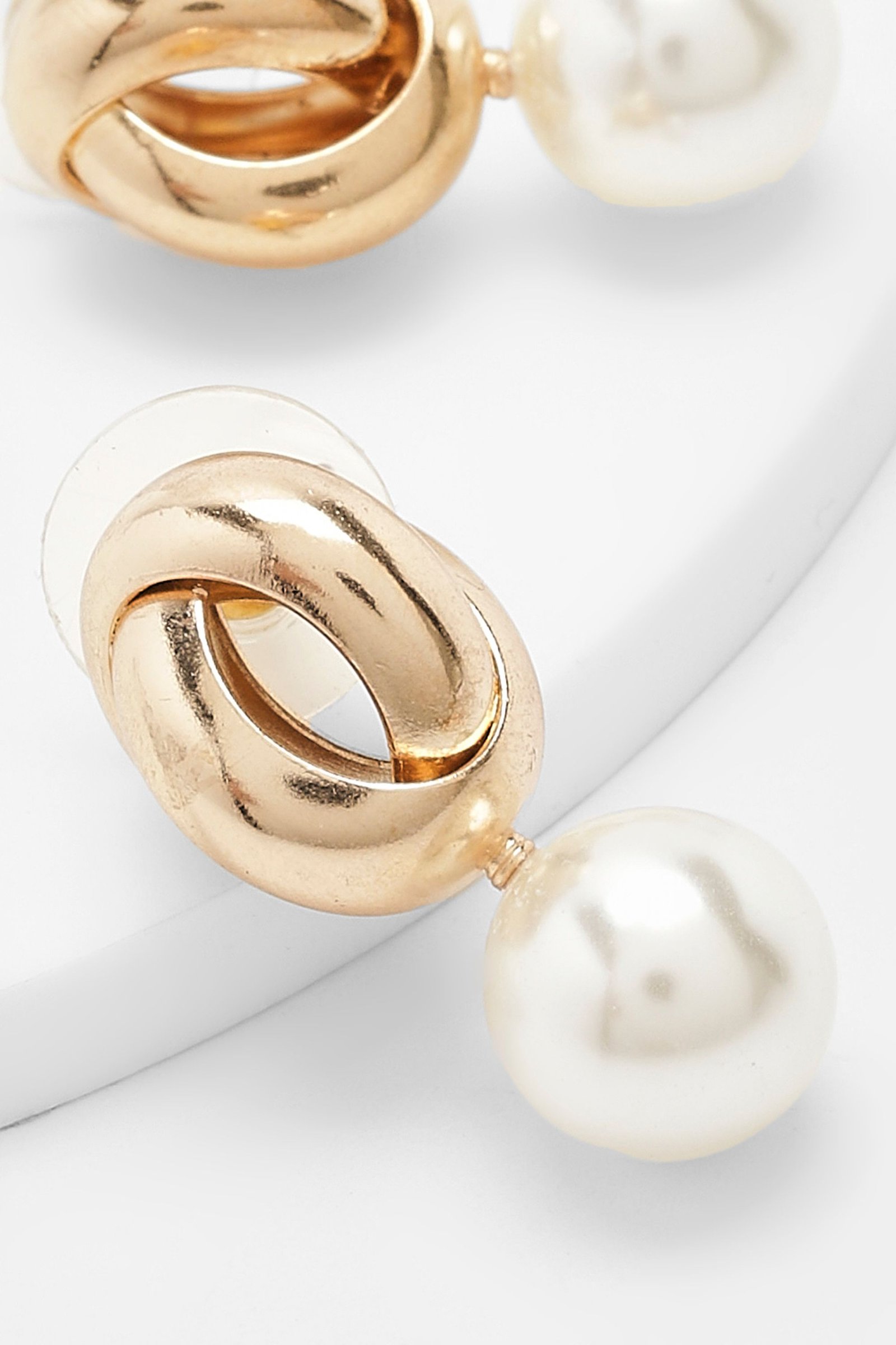 Boucles d'oreilles pendantes perle torsadée