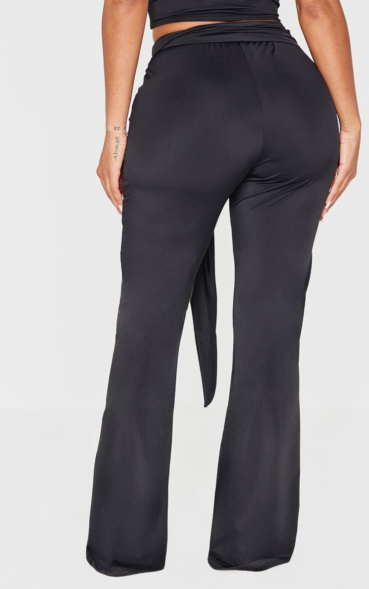 Sculpt wrap waist flared trousers