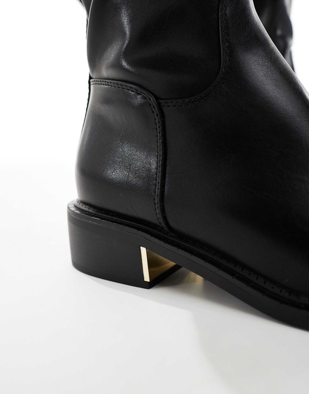 Buckle detail riding boots in black