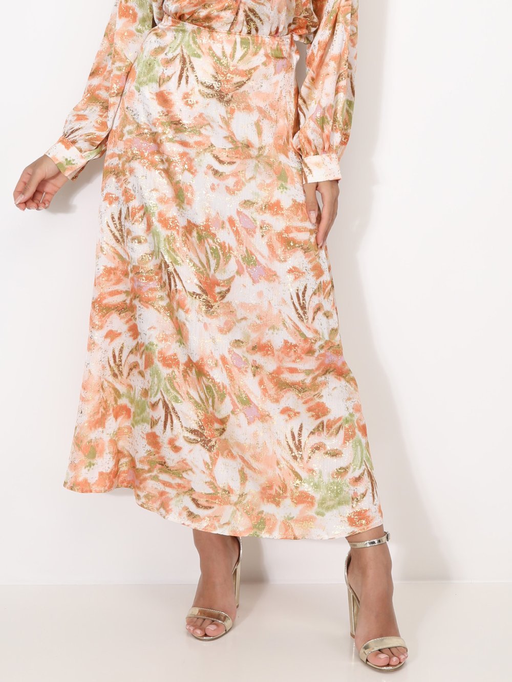 Orange flowing maxi skirt with gold print