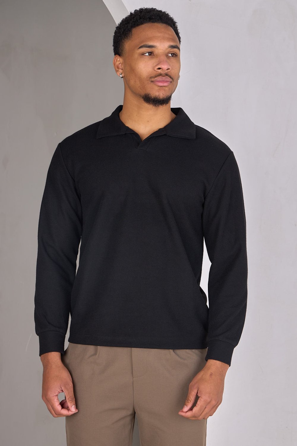 Black textured jumper with shirt collar