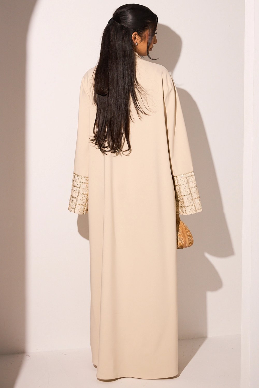 Beige abaya with gold sequins, V-neck and tassel
