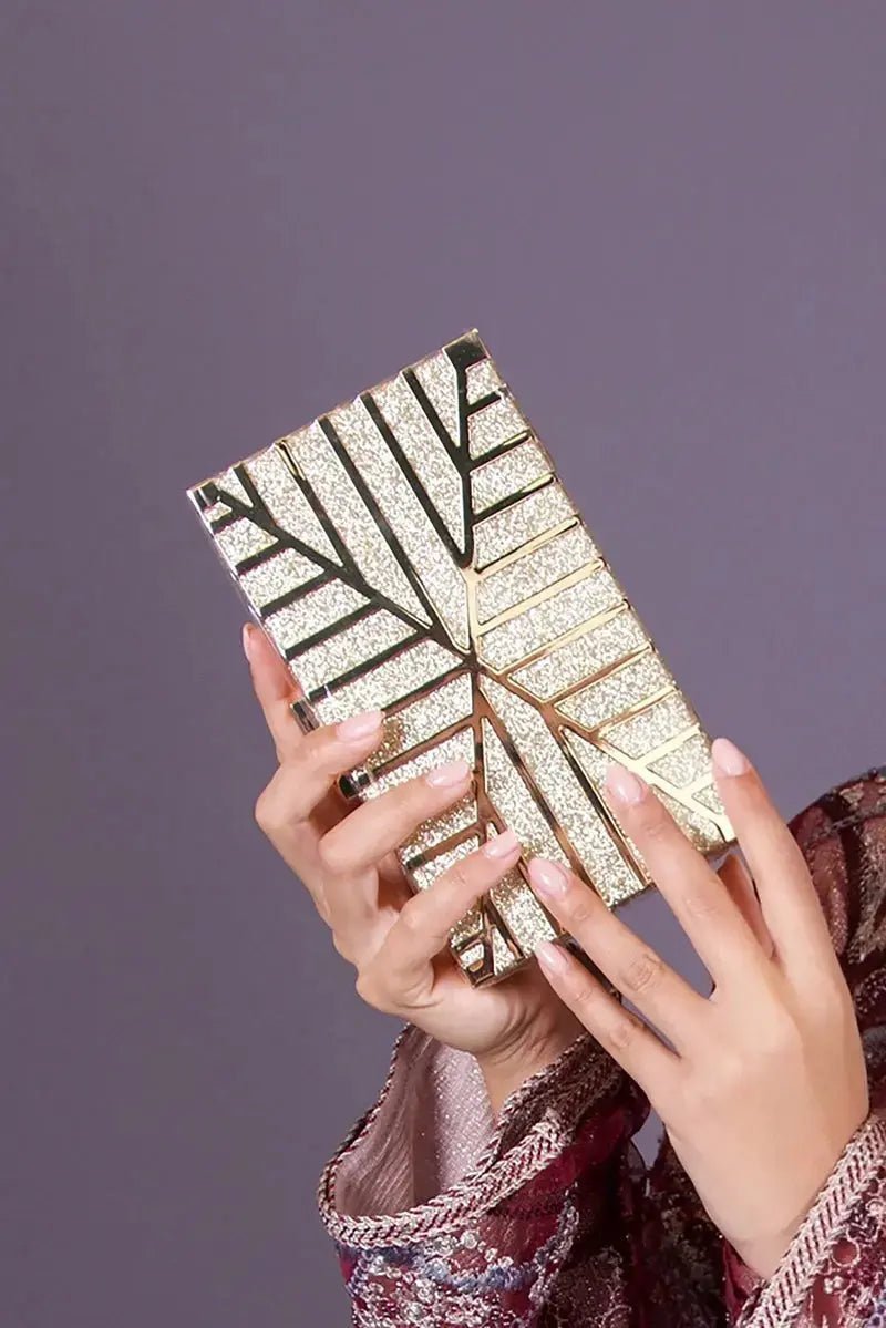 Minaudière rigide dorée à motif éventail