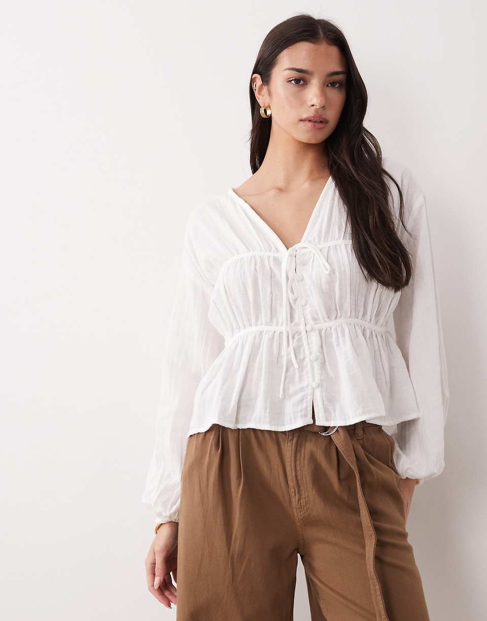 Button front babydoll top with long sleeves - Ivory